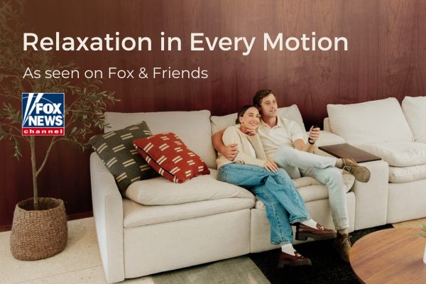 A couple relaxing on a cozy beige sectional sofa, with text