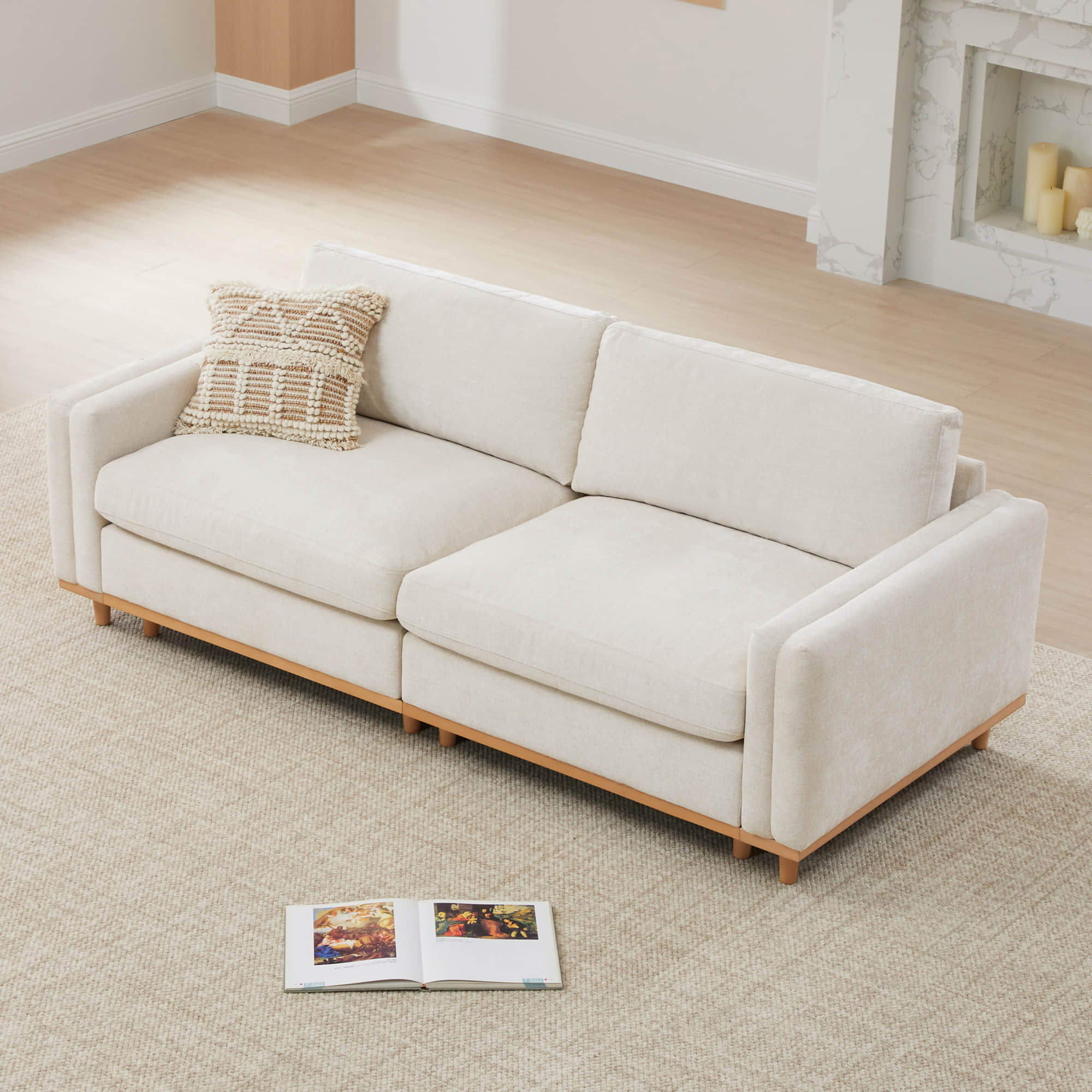 Liam 2-Piece sectional sofa with a beige design and cozy pillow in a modern living room - CHITA Living