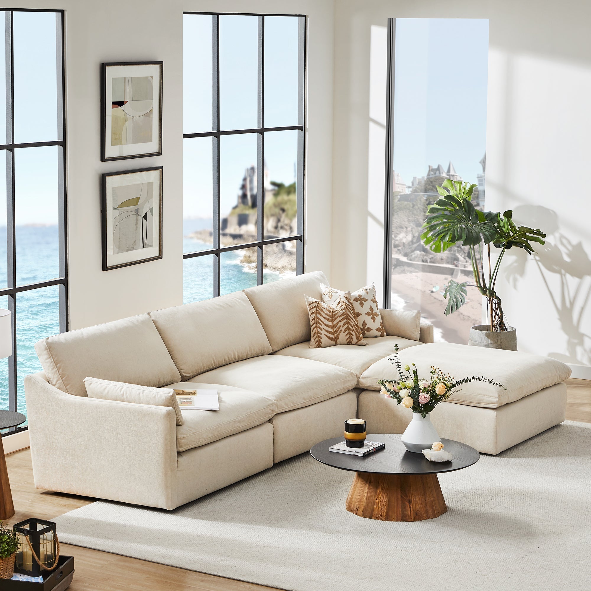 Kenna Modular Sofa-Chaise sectional in cream, modern living room, comfortable seating with ocean view.