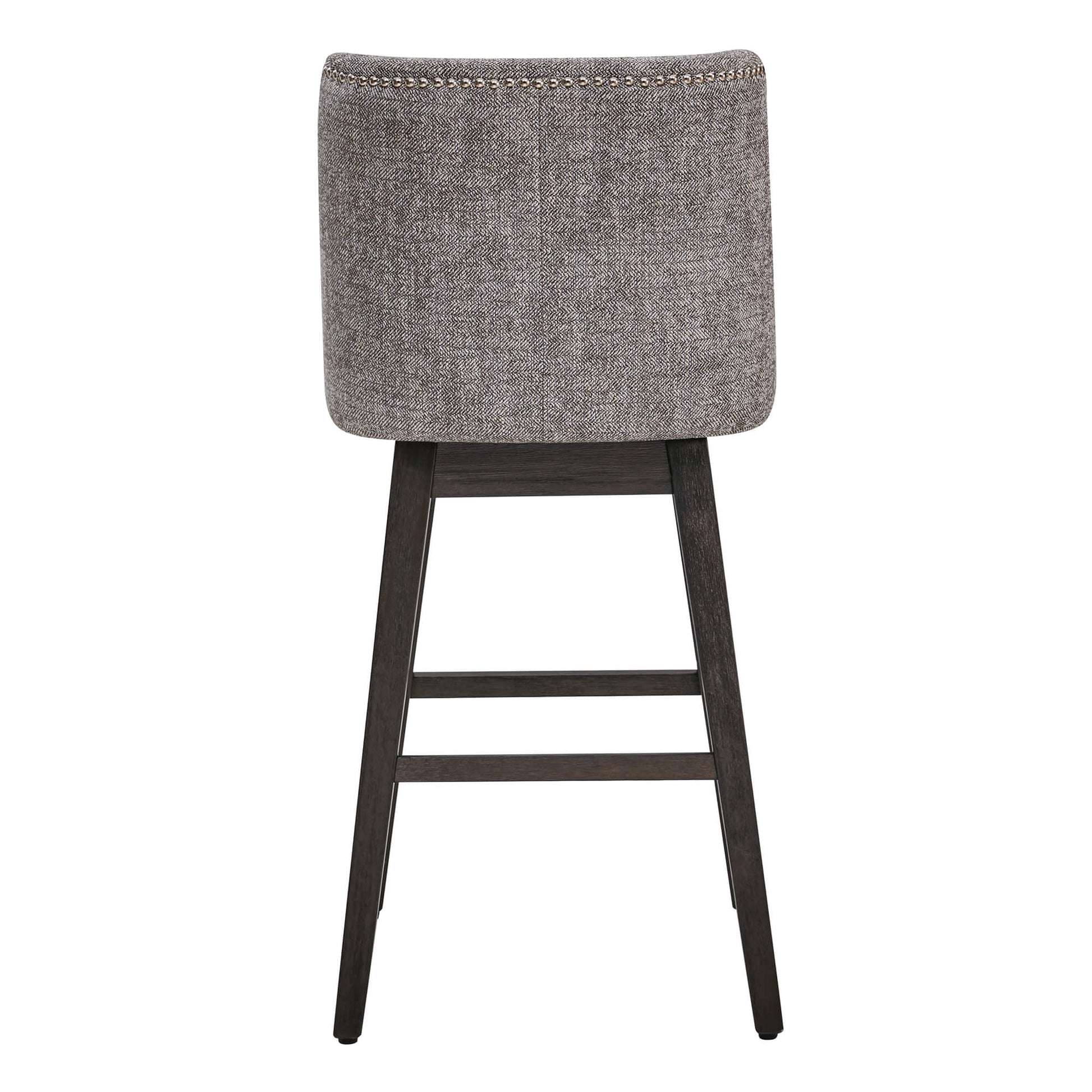 Back view of gray Asher swivel bar stool with silver nailhead trim on black wooden legs - CHITA Living