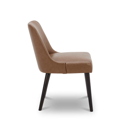 Side view of Rhett Dining Chair in brown faux leather with tapered legs - CHITA Living