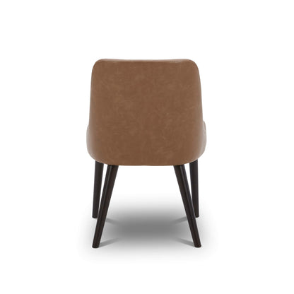 Back view of Rhett Dining Chair in brown faux leather with tapered legs - CHITA Living