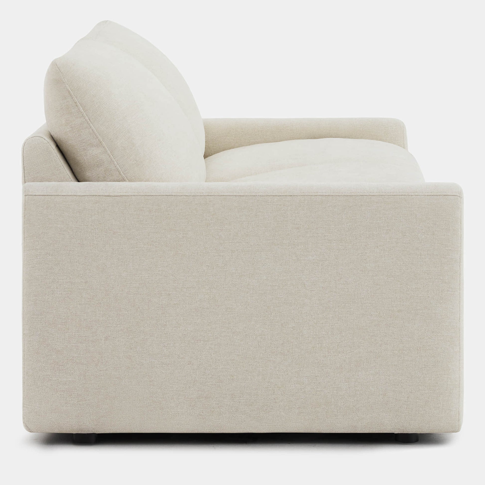 Side view of Ohana 2-Seat Motion Modular Sofa in soft beige fabric - CHITA Living