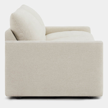 Side view of Ohana 2-Seat Motion Modular Sofa in soft beige fabric - CHITA Living