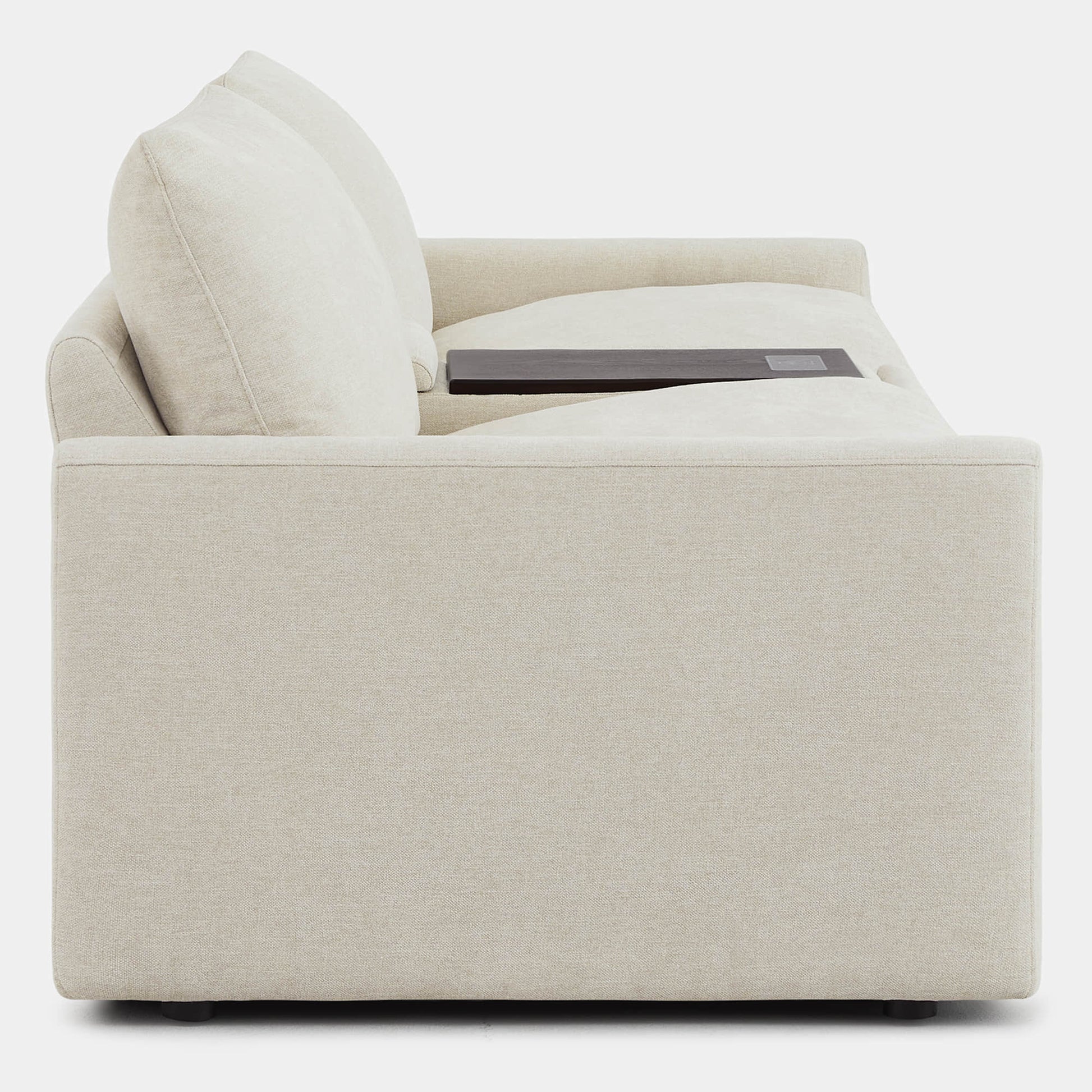 Side view of Ohana 2-Seat Motion Modular Sofa in light beige with charging ports - CHITA Living