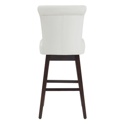 Back view of Alina modern swivel bar stool in white faux leather with dark wooden legs - CHITA Living