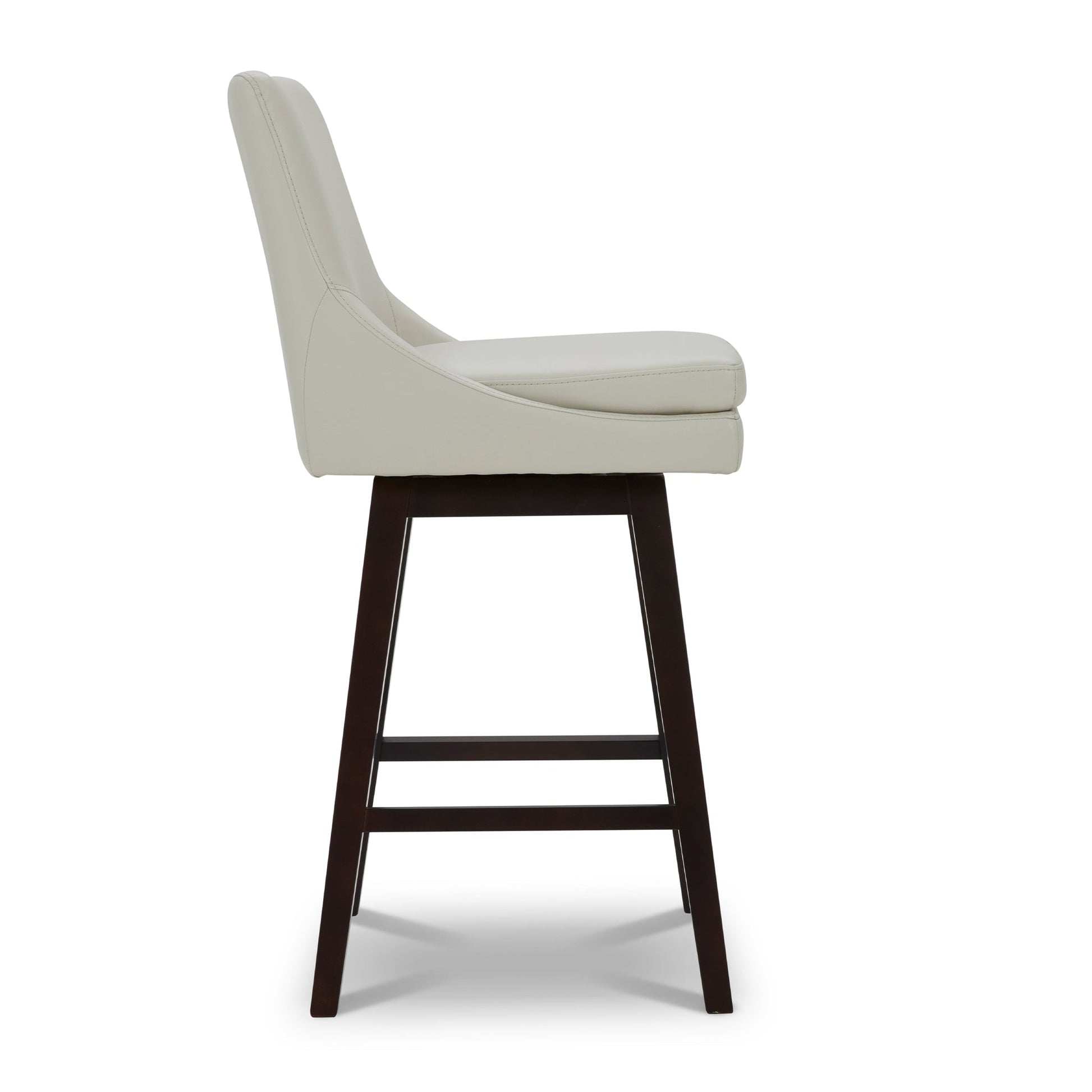 Lissa Swivel Bar Stool with white leather seat and dark wood legs, side profile view - CHITA Living
