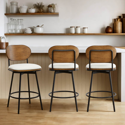 Set of three Aislinn swivel bar stools with cream seats and wooden backs at a kitchen island - CHITA Living