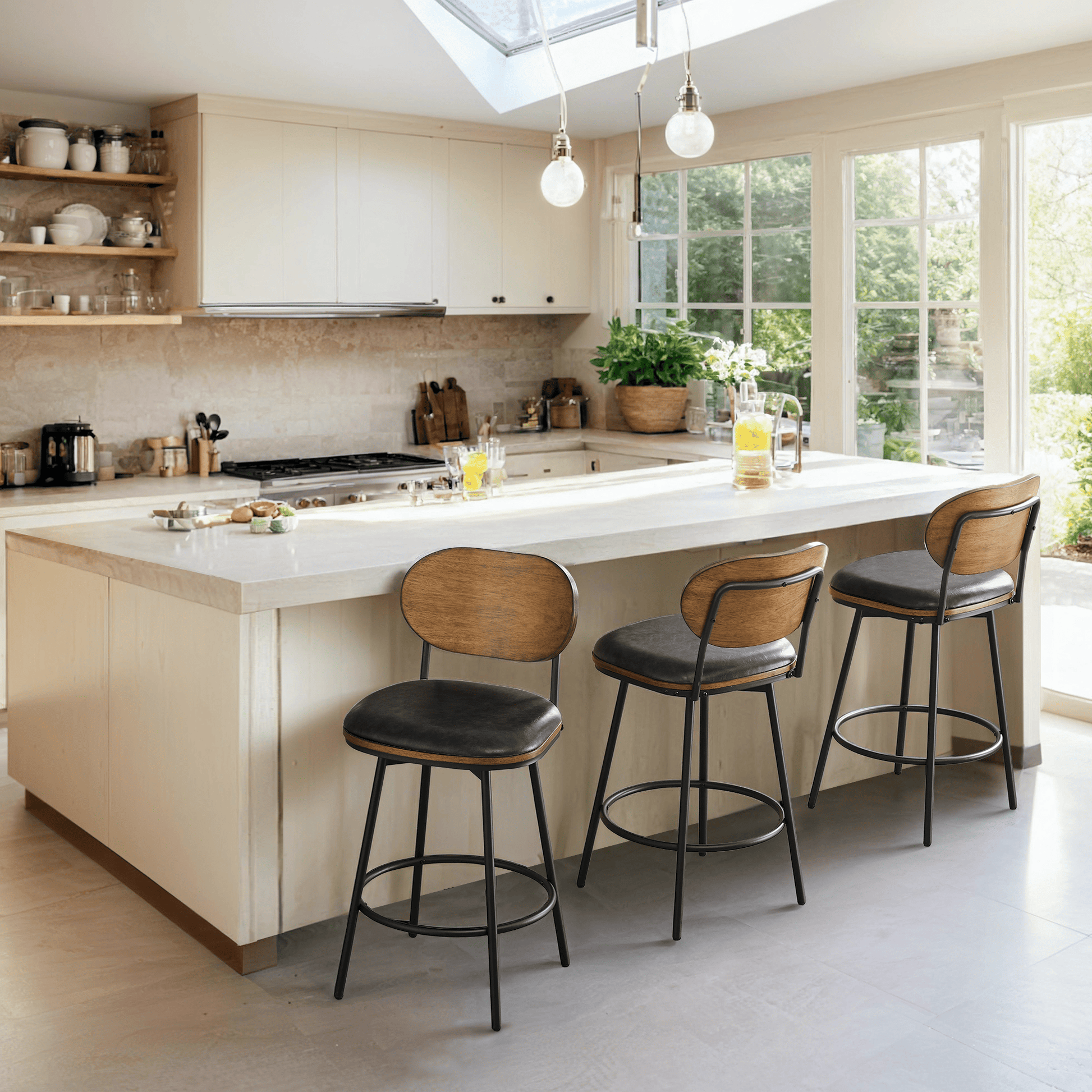 Set of three Aislinn swivel bar stools with wood backs and gray cushions at a kitchen island - CHITA Living