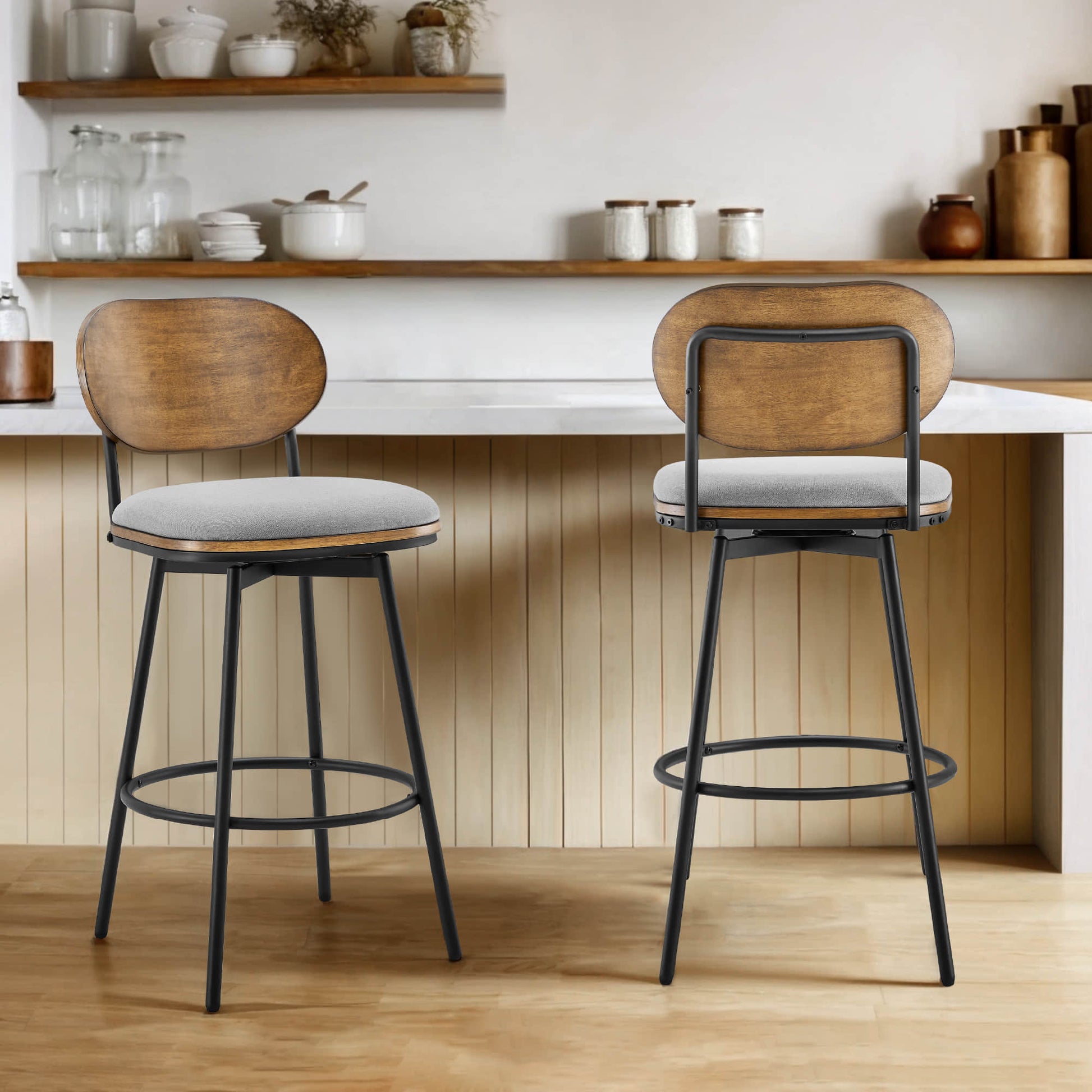 Aislinn swivel bar stools with gray cushions and wooden backs at a modern kitchen island - CHITA Living