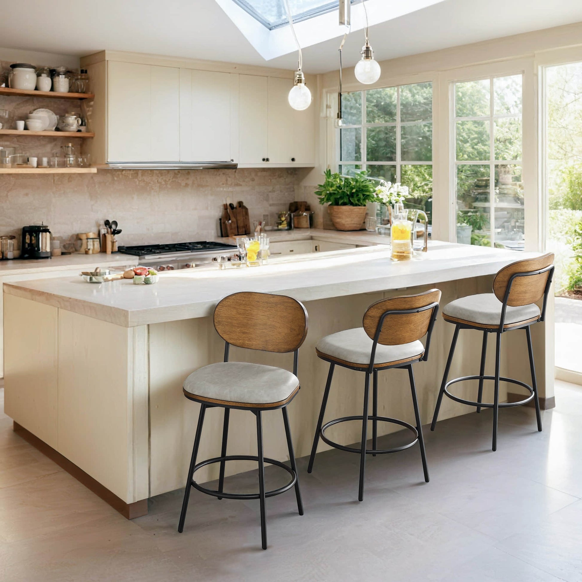 Aislinn swivel bar stools with gray cushions and wood backs at a modern kitchen island - CHITA Living