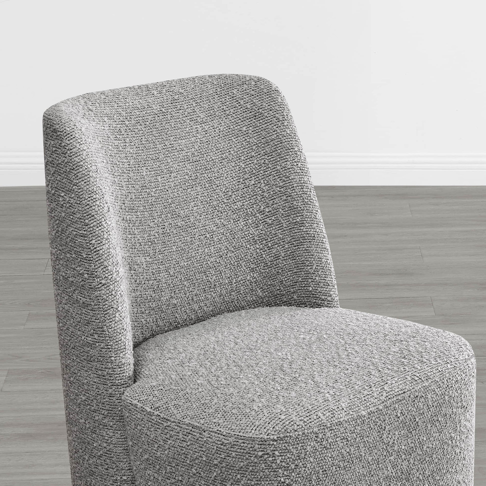 Textured gray wingback chair with a stylish curved design on a modern floor - CHITA Living