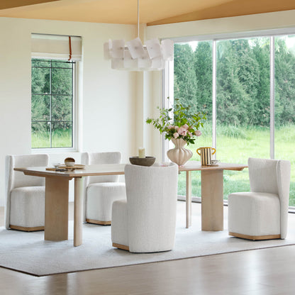 Modern dining room featuring stylish wingback chairs and a wooden dining table - CHITA Living
