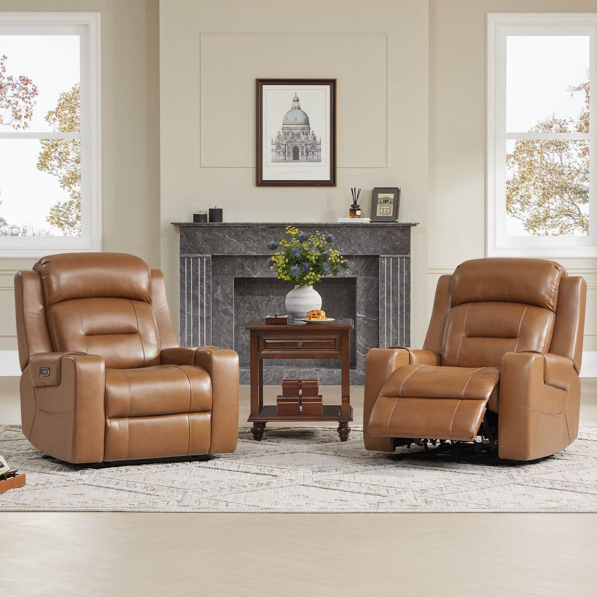 Two wall-hugging recliner with power headrests in a cozy living room with a fireplace and side table.