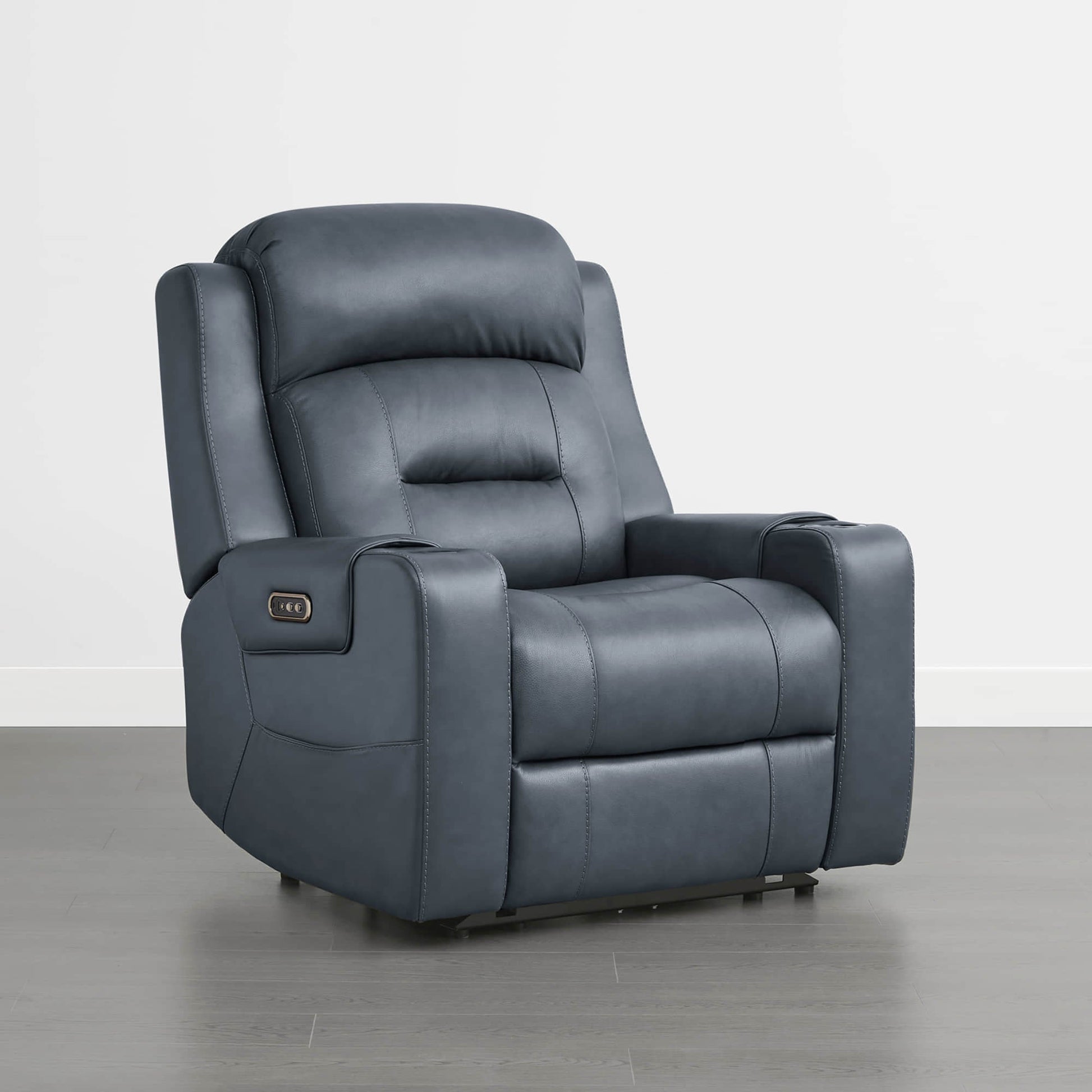 A dark blue leather recliner with a control panel on the armrest, set against a plain background.