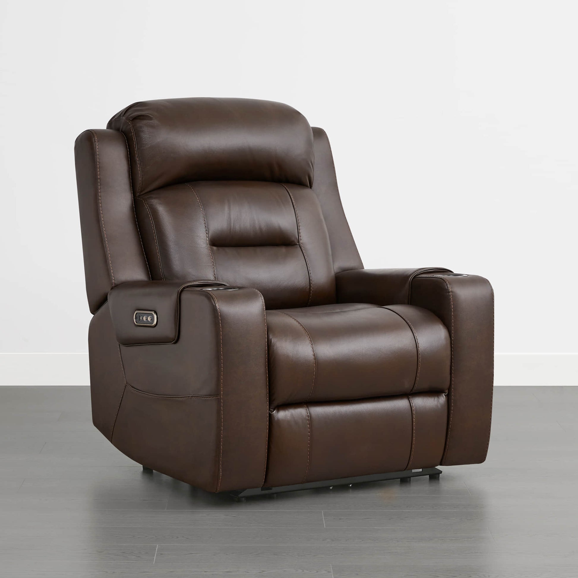 A dark brown leather recliner with a power headrest, cup holders, and control panel on the armrest.