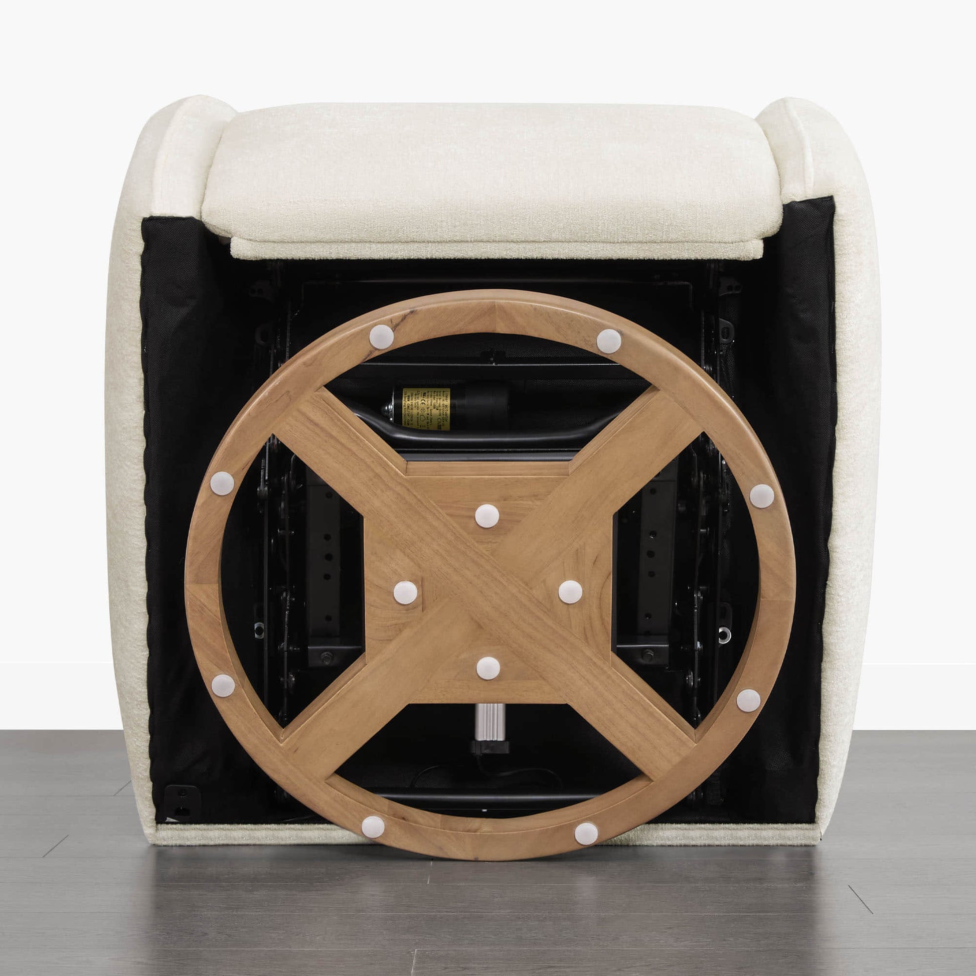Janice Power Swivel Recliner wooden base and swivel mechanism detail, modern nursery furniture.