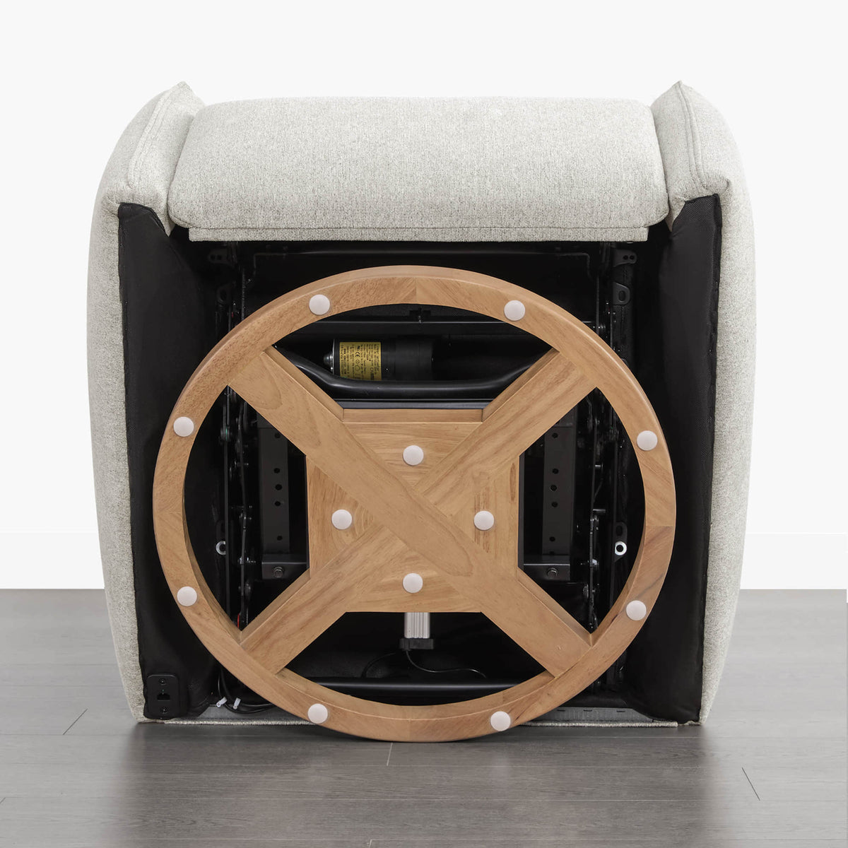 Janice Power Swivel Nursery Glider Recliner wooden base and swivel mechanism detail.