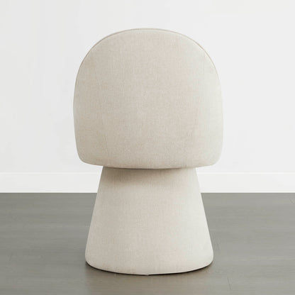 Rear view of a cream swivel chair with a rounded backrest and modern design.