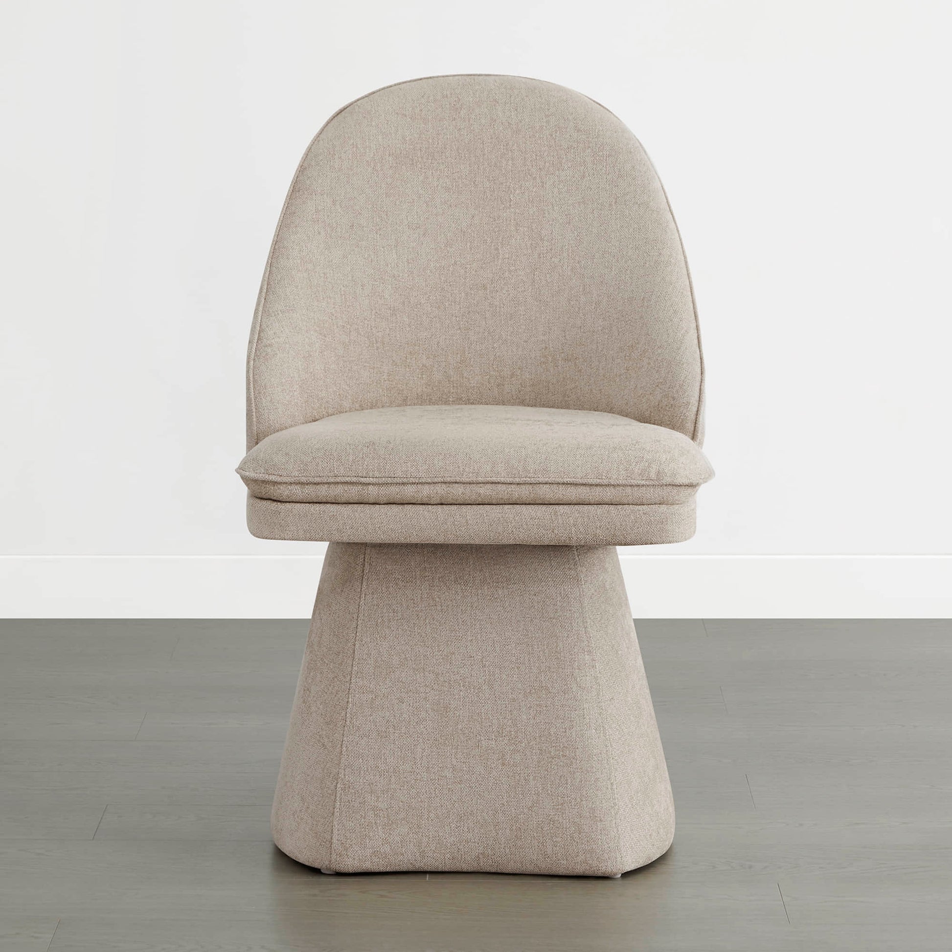 Elegant beige chair with a sleek design, perfect for modern interiors.