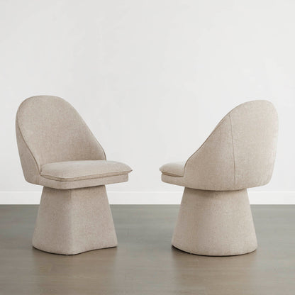 Beige swivel chairs with modern design, perfect for stylish dining spaces.