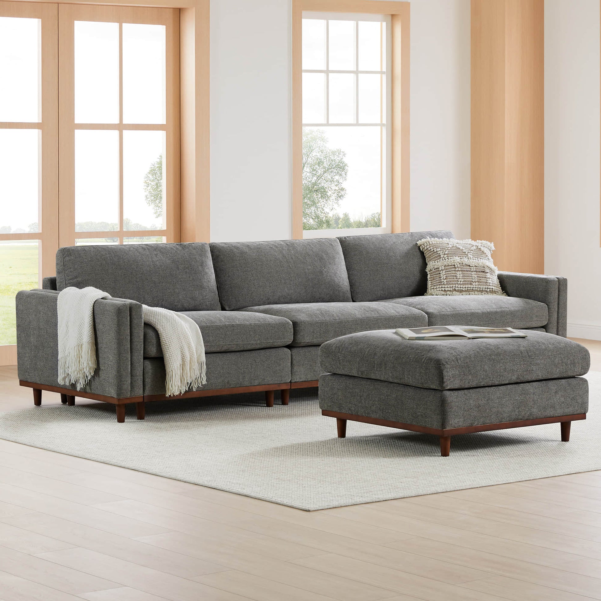 Liam 4-Piece Overstuffed Sectional Sofa in grey with matching ottoman in modern living room - CHITA Living