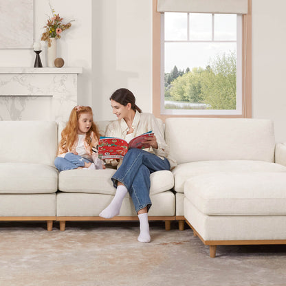 Mother and daughter reading on Liam 4-piece sectional sofa in bright living room - CHITA Living