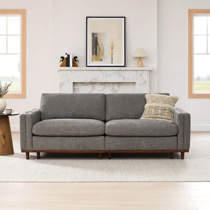 Gray 2-piece modular sectional sofa with wooden legs in a modern living room - CHITA Living