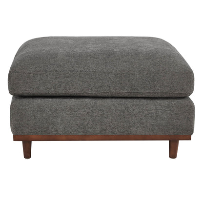 Liam modular ottoman in dark gray fabric with wooden base in modern living space - CHITA Living