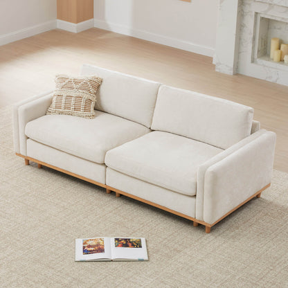 Liam 2-Piece sectional sofa with a beige design and cozy pillow in a modern living room - CHITA Living