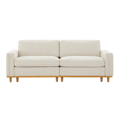Cream 2-piece modular sectional sofa with wood base in a modern living room - CHITA Living