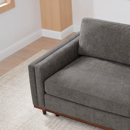 Liam Overstuffed Modular Sofa top view with dark gray fabric and wooden base in bright space - CHITA Living