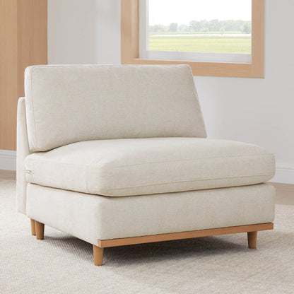 Liam modular sectional chair with light fabric and wooden legs in modern interior - CHITA Living