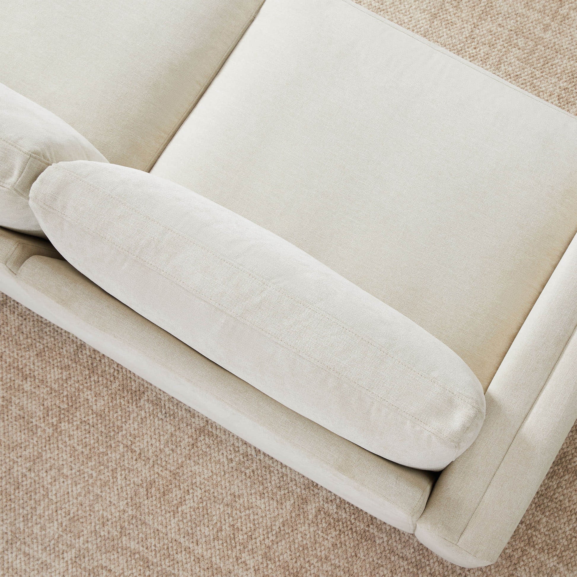 Top view of Liam sectional sofa with soft beige cushions and a cozy texture - CHITA Living
