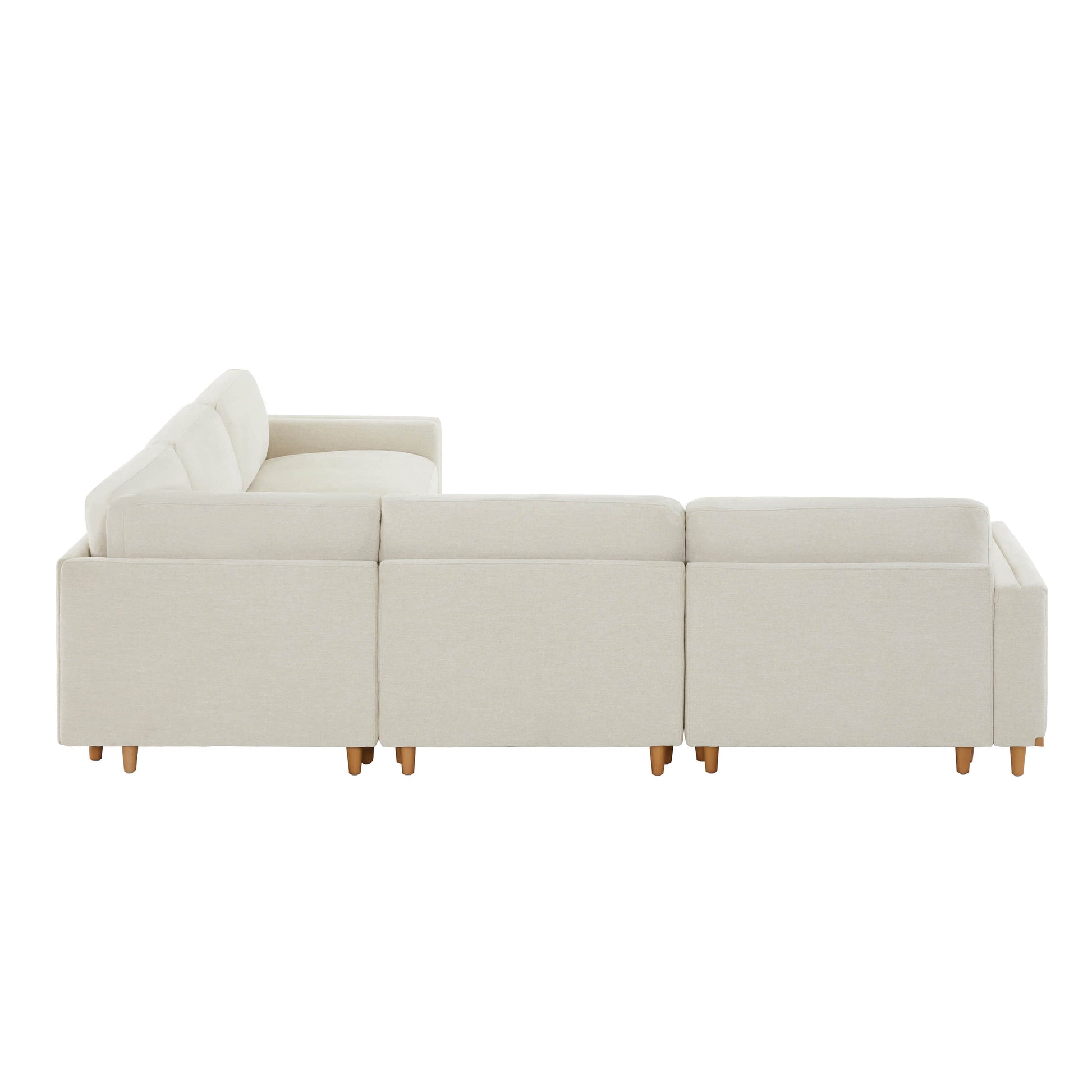 Liam 5-Piece Overstuffed Sectional in light fabric viewed from side in modern living room - CHITA Living