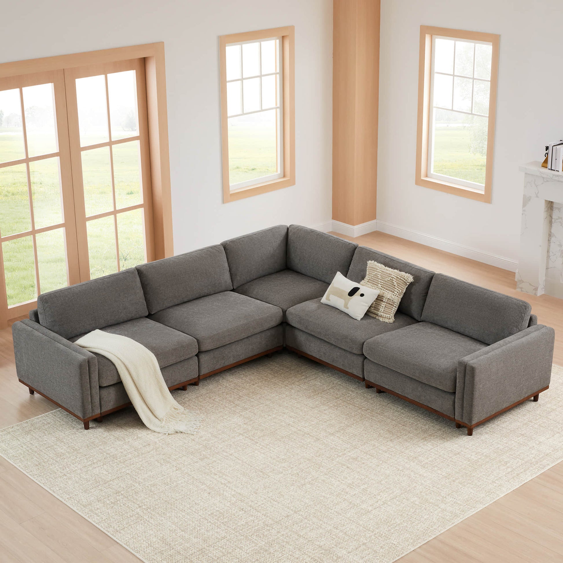 Liam 5-Piece Overstuffed Sectional sofa in gray fabric in bright, modern living room - CHITA Living