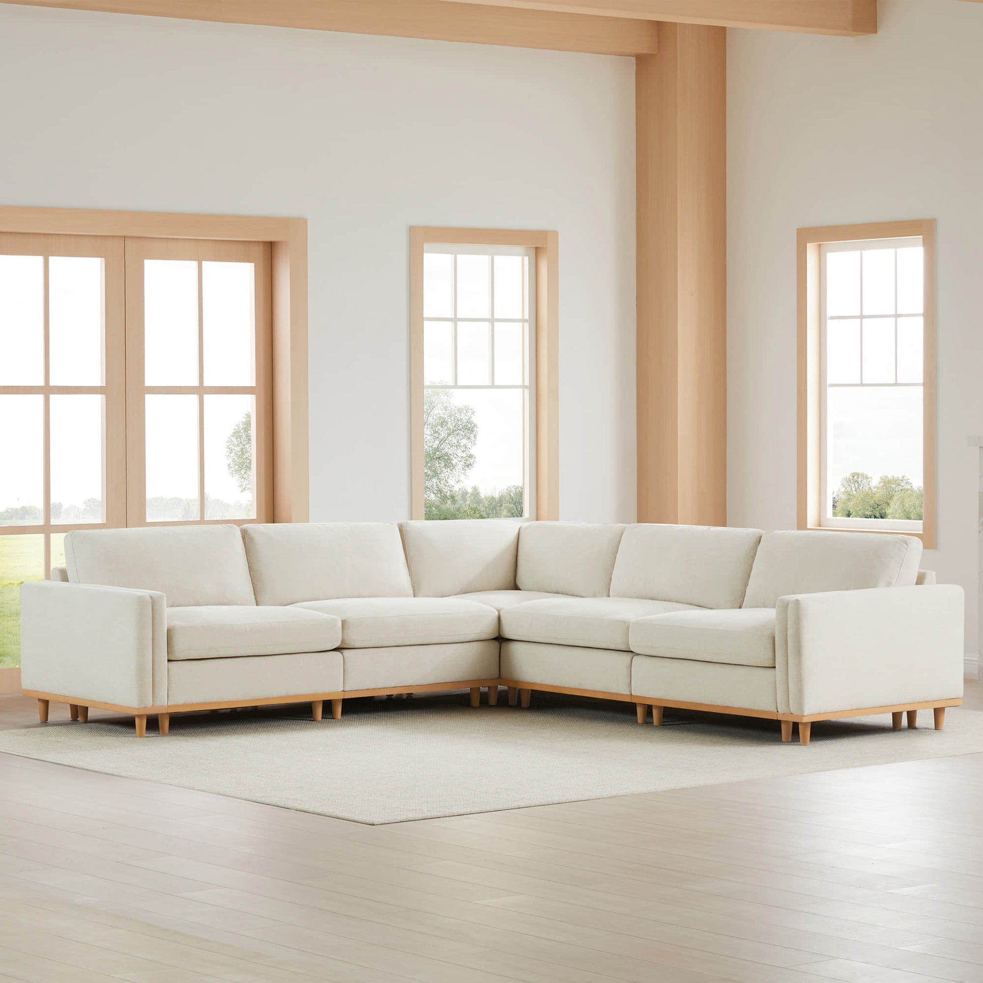 Liam 5-Piece Overstuffed Sectional in a bright living room with large windows - CHITA Living