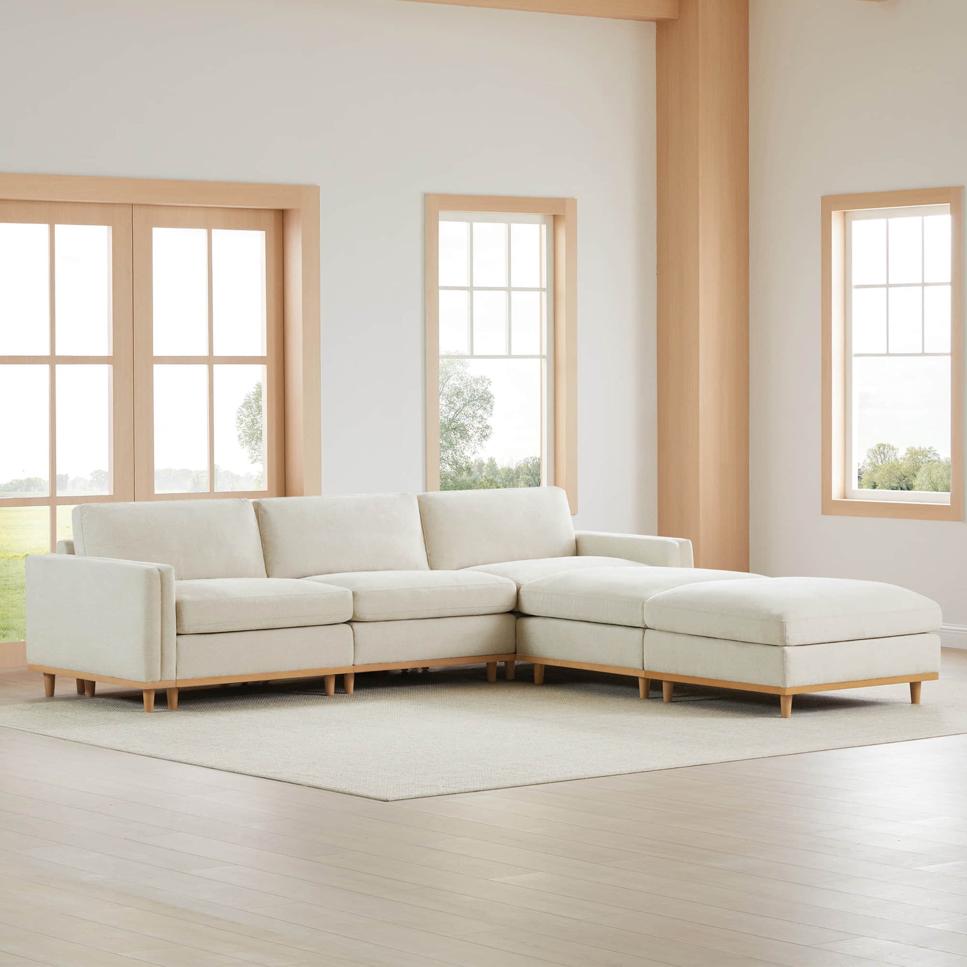 Liam 5-Piece Sectional in bright living room with natural light and light fabric - CHITA Living