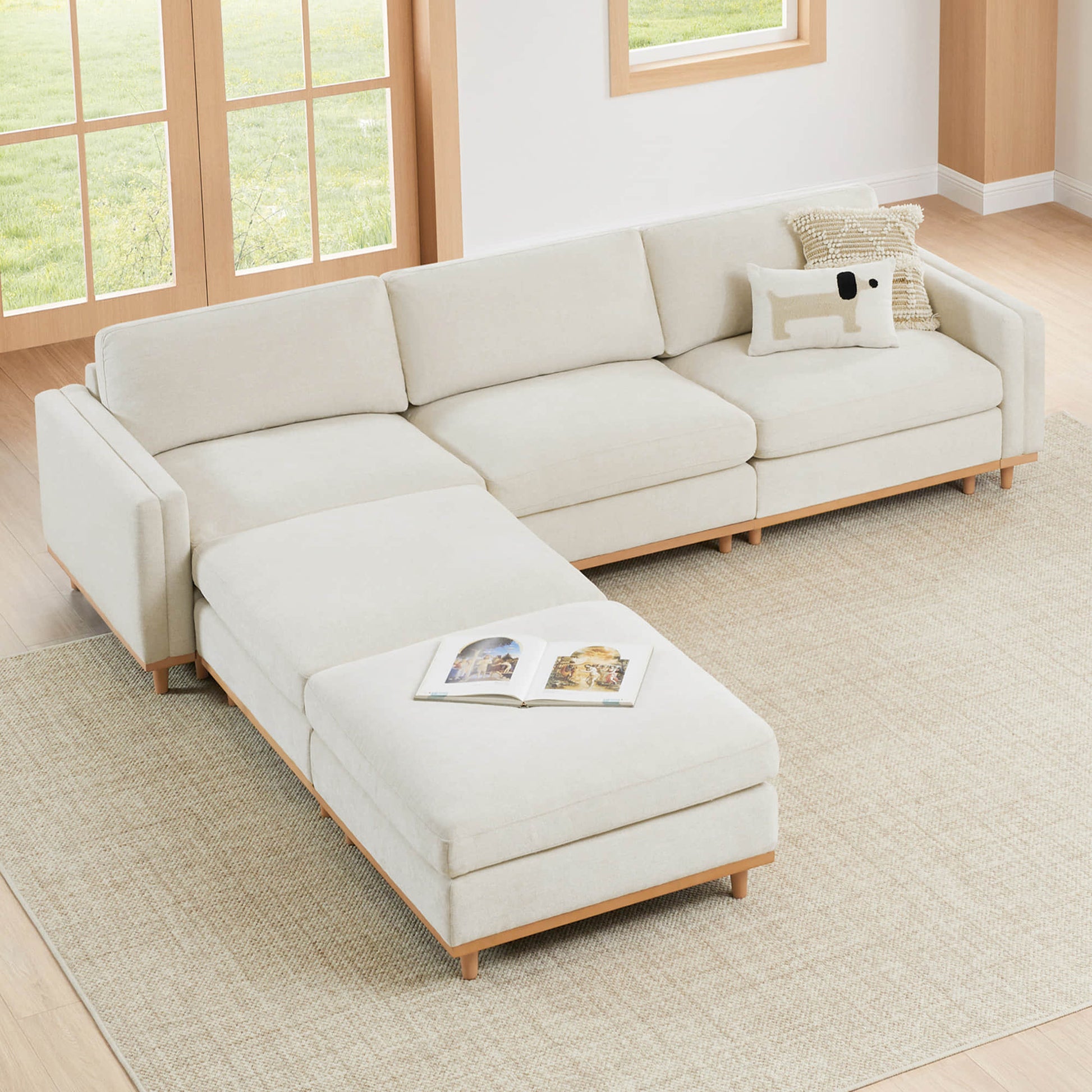 Liam 5-Piece Overstuffed Sectional in a bright modern living room with a book on the chaise - CHITA Living