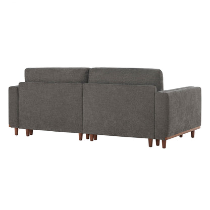Back view of slate gray modular sofa with wooden legs in modern living room - CHITA Living