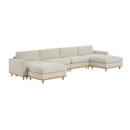 Liam modular sectional sofa in light beige fabric with wooden legs in bright living room - CHITA Living