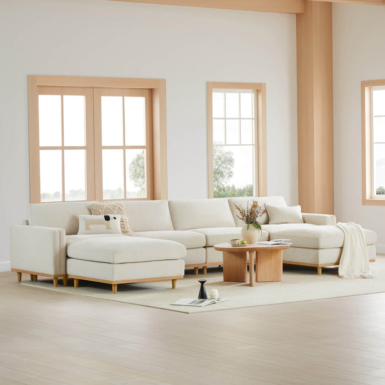 Liam 6-Piece Overstuffed Feather Modular Sectional in cozy living room setting - CHITA Living
