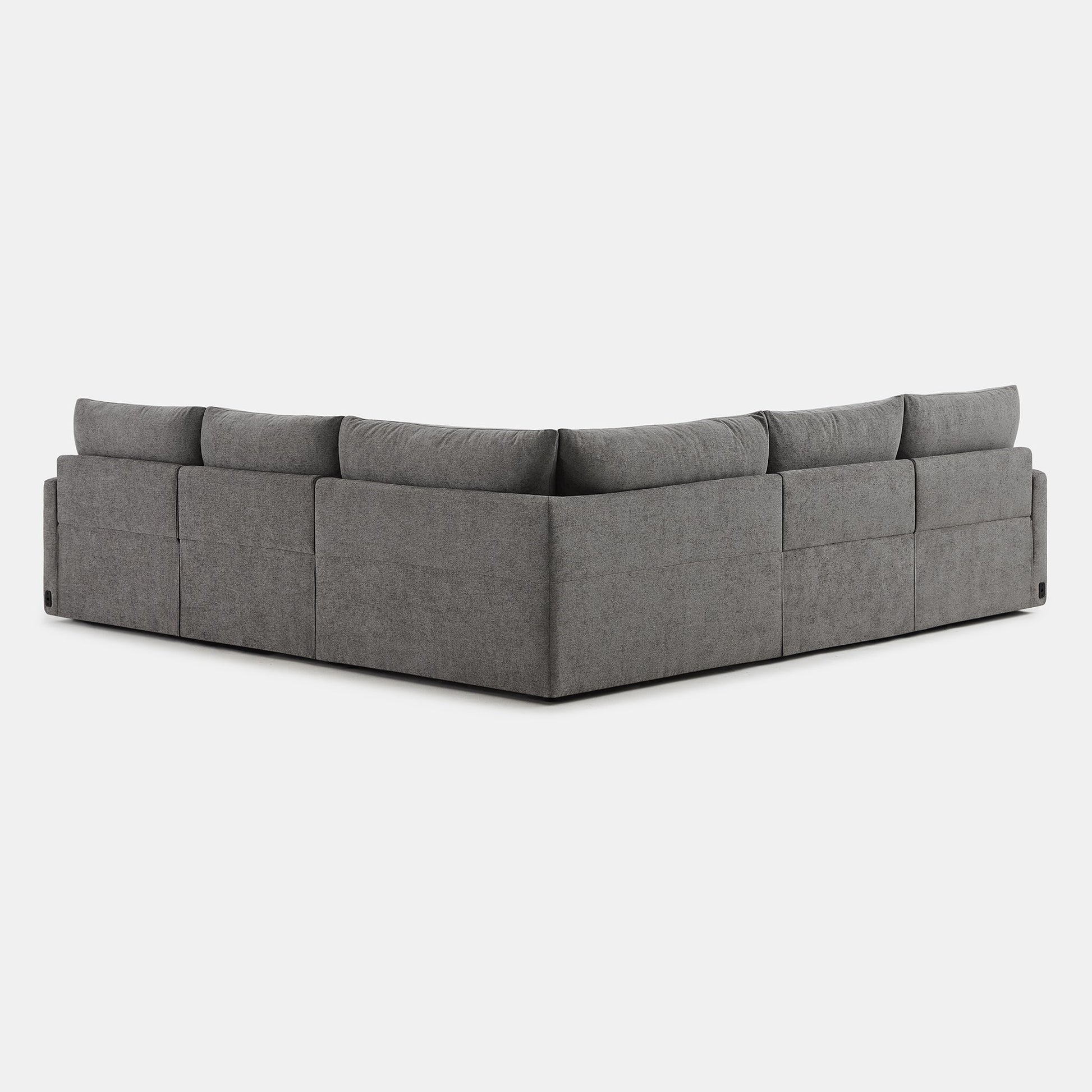 Corner view of Ohana 5-seat modular sofa in grey with plush cushions - CHITA Living