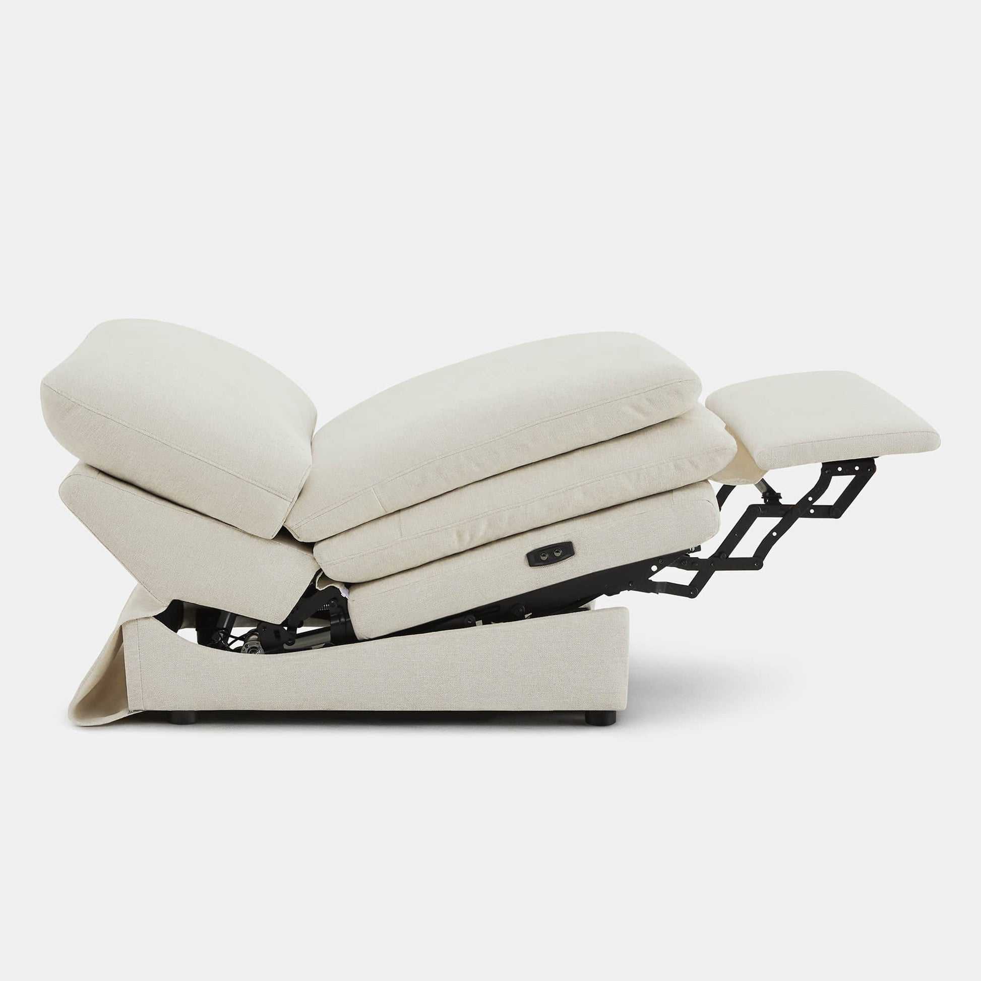 Cream armless recliner chair in reclining position showcasing plush cushions and footrest - CHITA Living