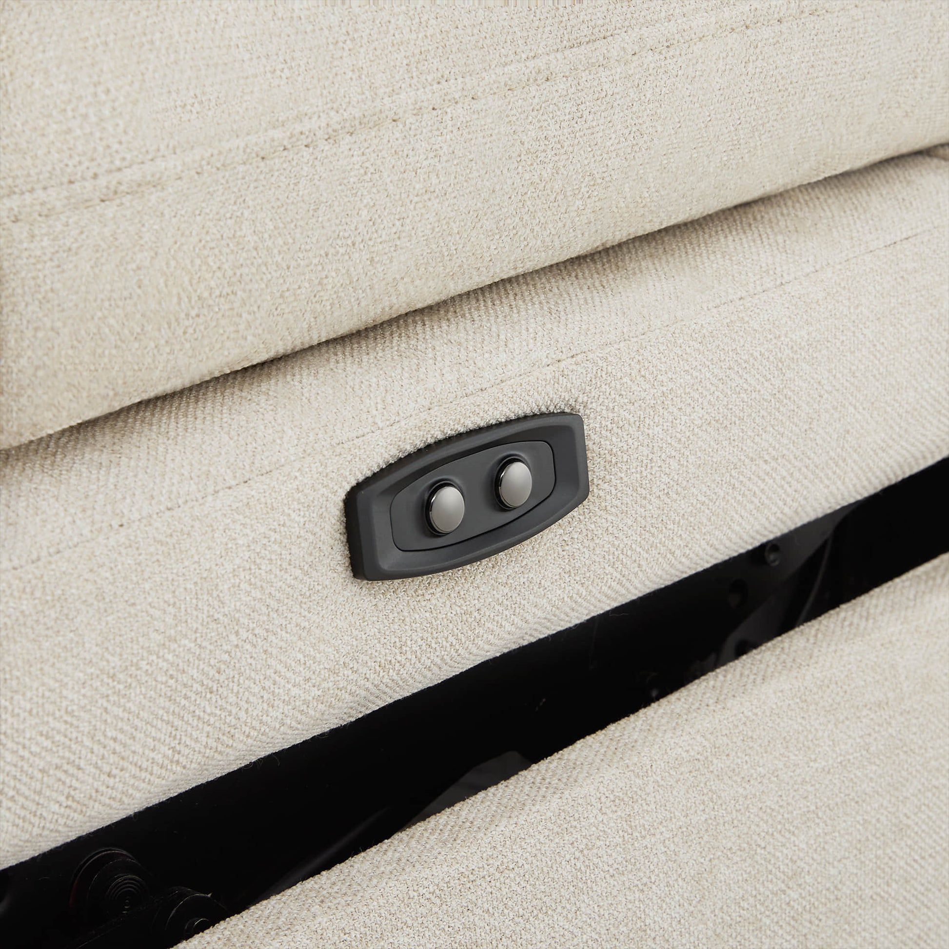 Reclining control buttons on Ohana 2-Seat Motion Modular Sofa in light fabric - CHITA Living