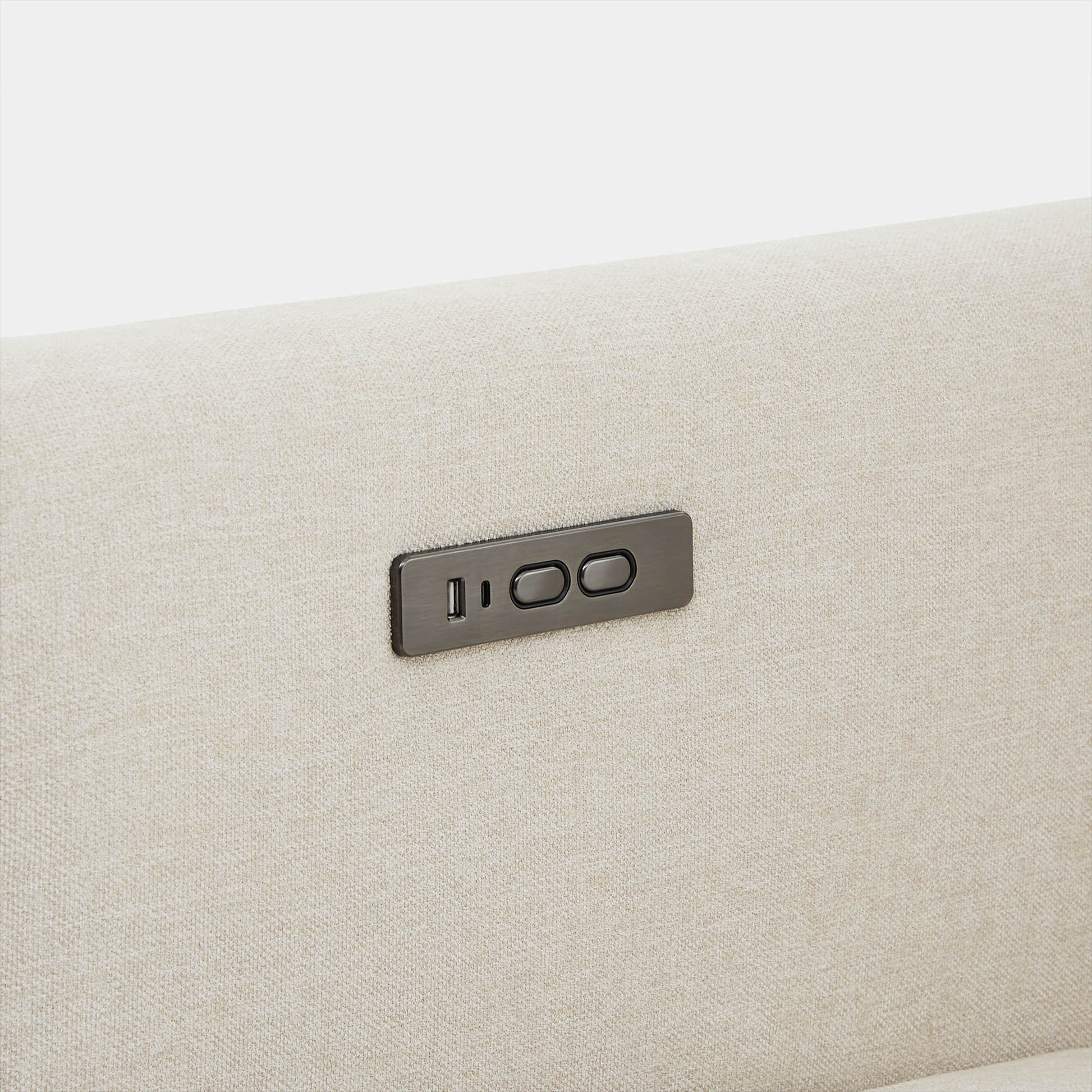 Reclining controls and USB ports on Ohana 2-Seat Motion Modular Sofa in light beige fabric - CHITA Living