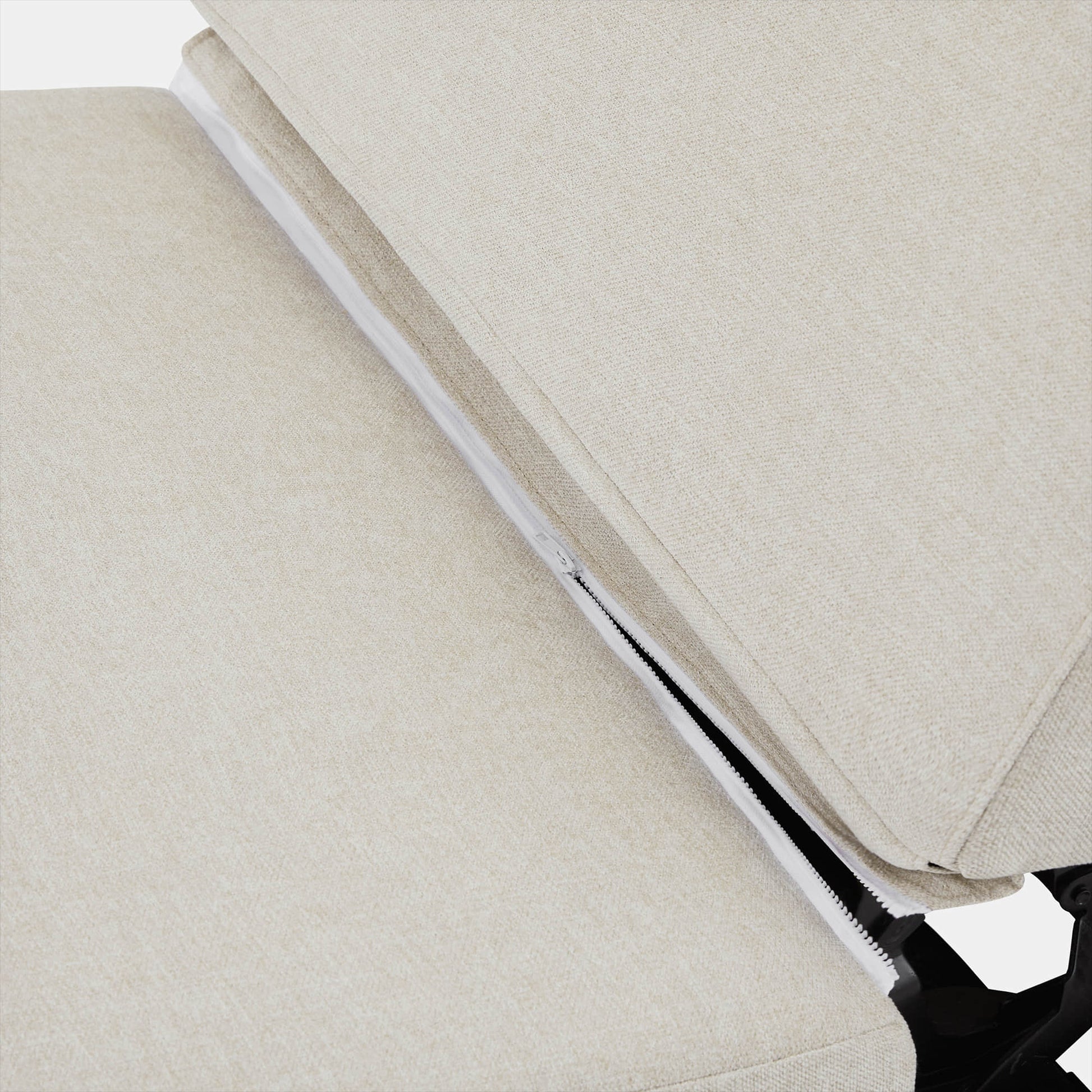Close-up of zip-off cushion covers on Ohana modular sofa, highlighting soft beige fabric - CHITA Living