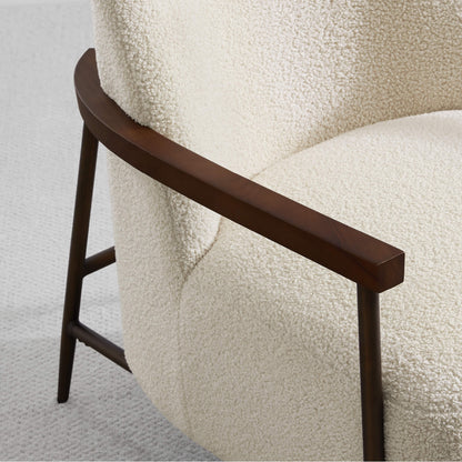 Close-up of Teddi Accent Chair's plush fabric and wood armrest in modern decor - CHITA Living