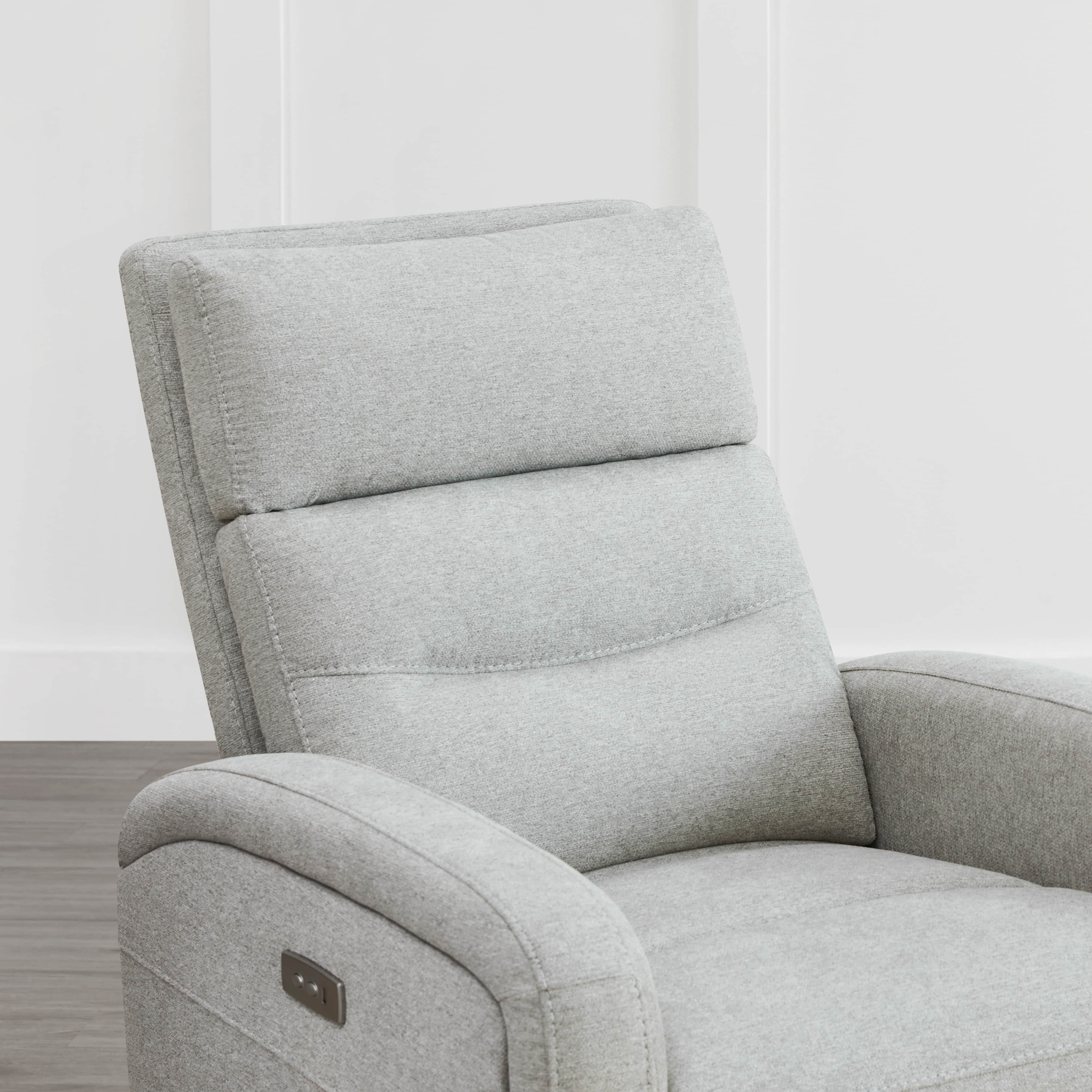 Close-up of light gray Theo Power Swivel Glider Recliner with headrest and sleek arms - CHITA Living