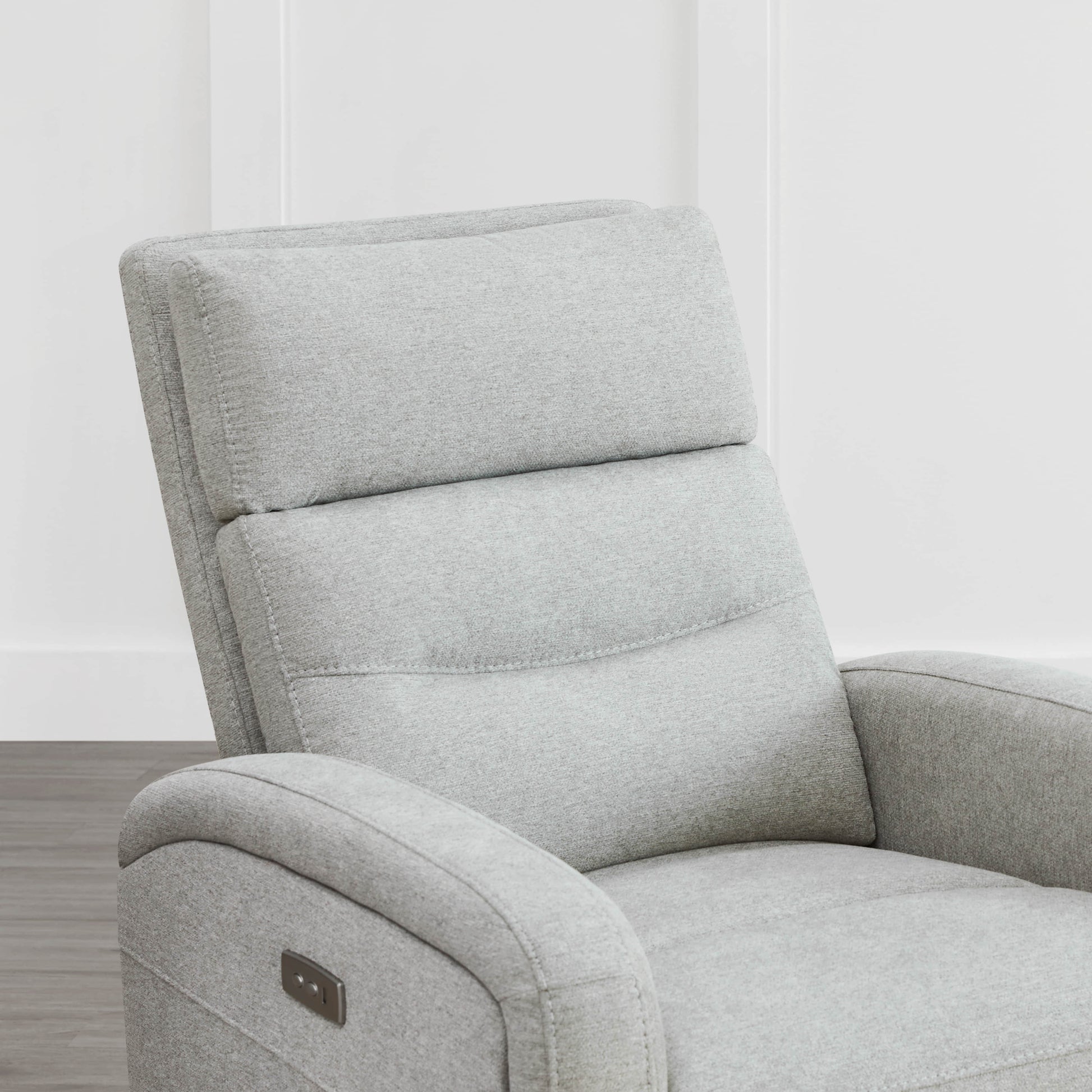 Close-up of light gray Theo Power Swivel Glider Recliner with headrest and sleek arms - CHITA Living